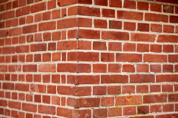 Hoe gevel schoonmaken en opnieuw voegen